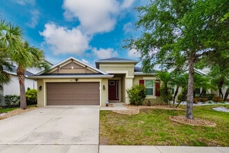 Building Photo - 8811 Tropical Palm Dr