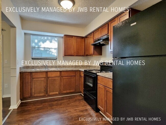 Foto del edificio - 6624 Wellington Pl Ln