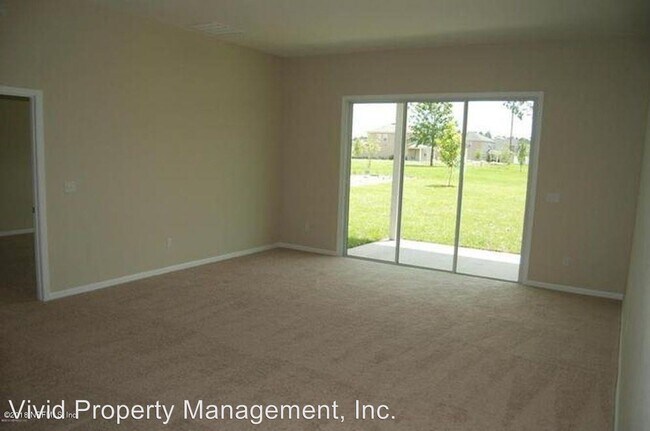 Foto del edificio - 4646 Plantation Oaks Blvd