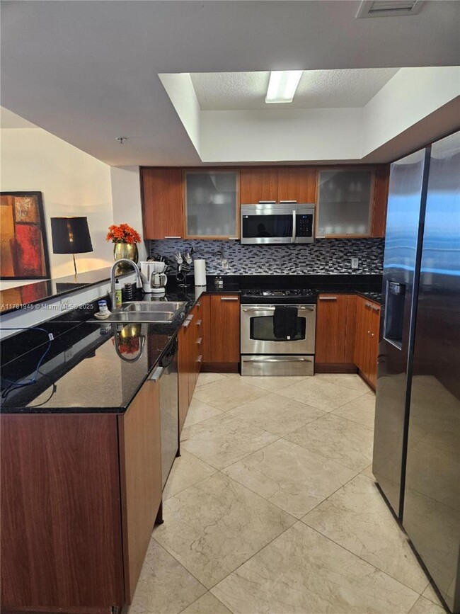 Building Photo - 16699 Collins Ave