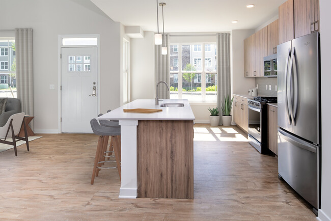 Upgrade Scheme townhome kitchen and dining areas with hard surface flooring - Avalon Old Bridge