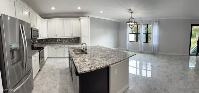 Building Photo - 3 br, 2.5 bath House - 6239 Oceanaire Way