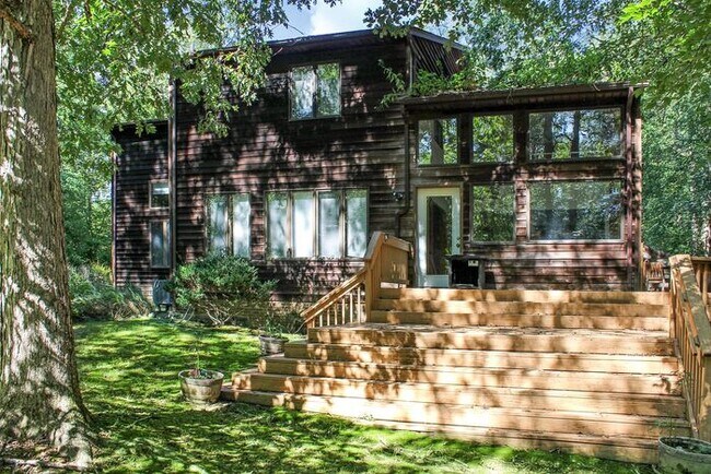 Building Photo - Contemporary Modern Charm Surrounded by wo...
