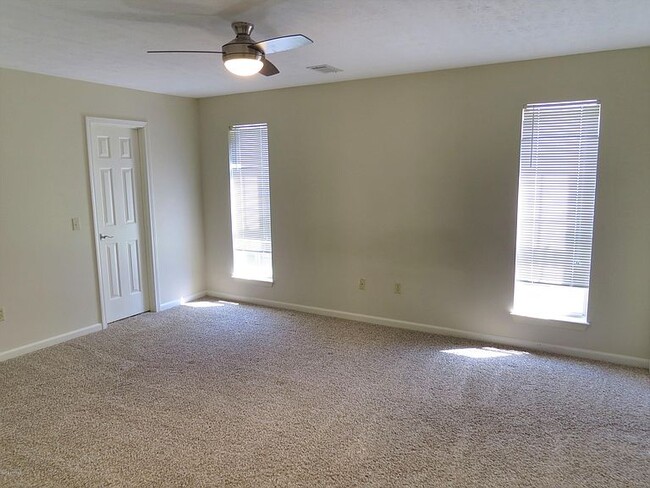 Master bedroom. - 8380 Northside Dr