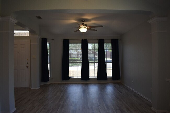 Building Photo - TWO LIVING ROOMS AND TWO DINING ROOMS! Sol...
