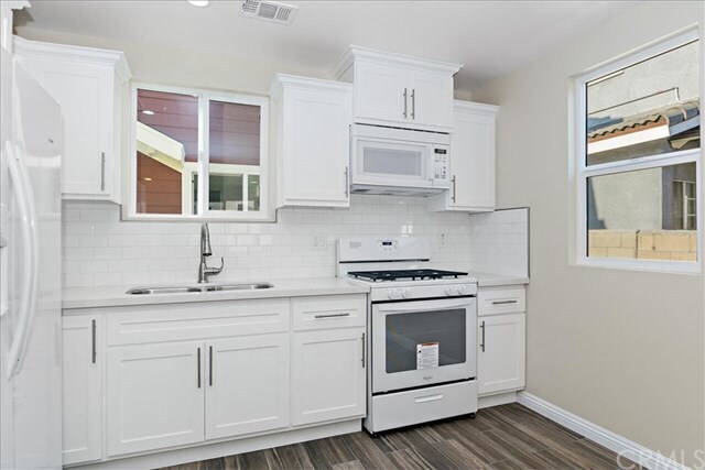 Building Photo - 1327 W 37th Pl