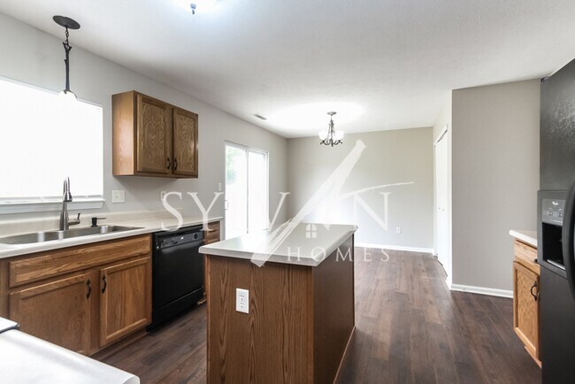 Foto del edificio - The living is easy in this lovely 3 bedroo...