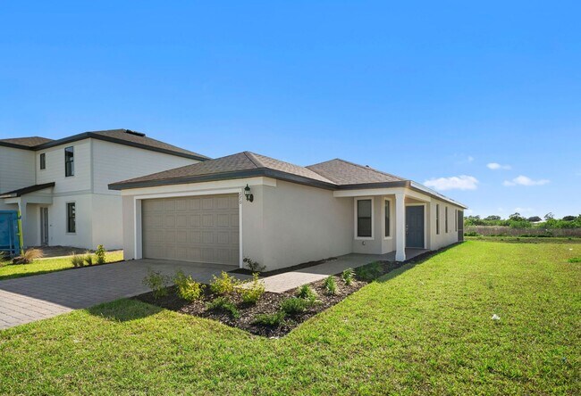 Foto del edificio - Newly constructed property offers four spacious bedrooms, two full bath in Lehigh Acres