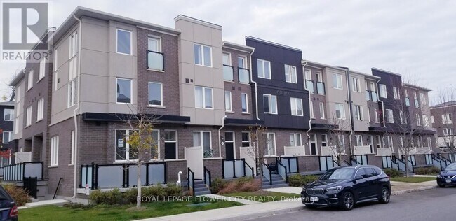 Building Photo - 10-45 HURON PARK Pl