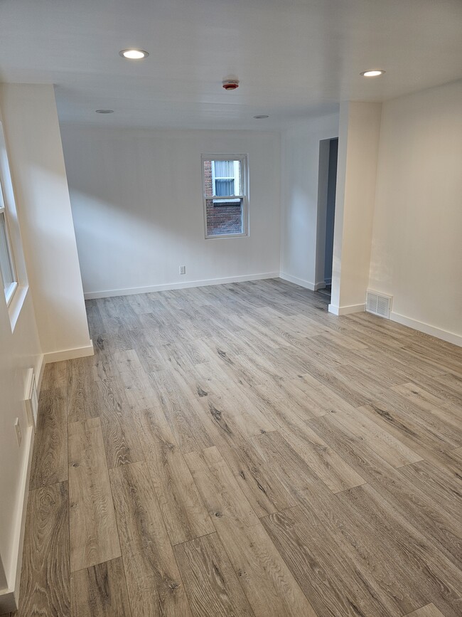 open concept living room and dining room - 4355 Coleridge St