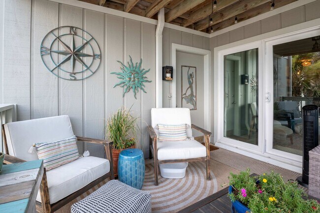 Building Photo - OFF-SEASON FURNISHED OASIS JUST STEPS FROM THE SAND