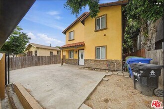 Building Photo - 8822 Orchard Ave