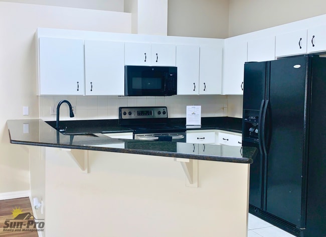 Foto del edificio - 5988 Sawgrass Point Dr