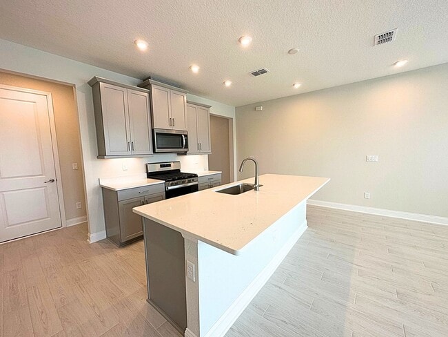 Building Photo - BRAND NEW, Amazing Location Near Beaches!