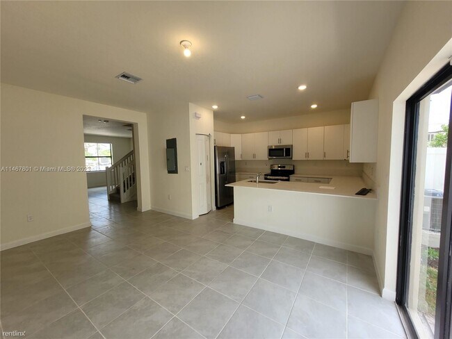 Building Photo - 3 br, 2.5 bath House - 11446 W 33rd Way