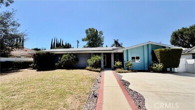 Building Photo - 7843 Woodlake Ave