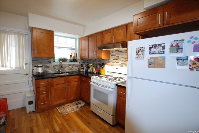 Building Photo - 214-12-214-40 40th Ave