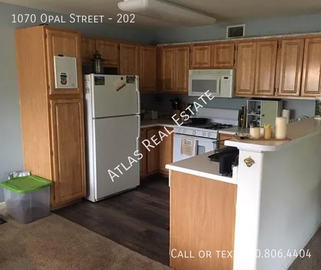 Building Photo - Introducing Your Dream Condominium: A Perf...