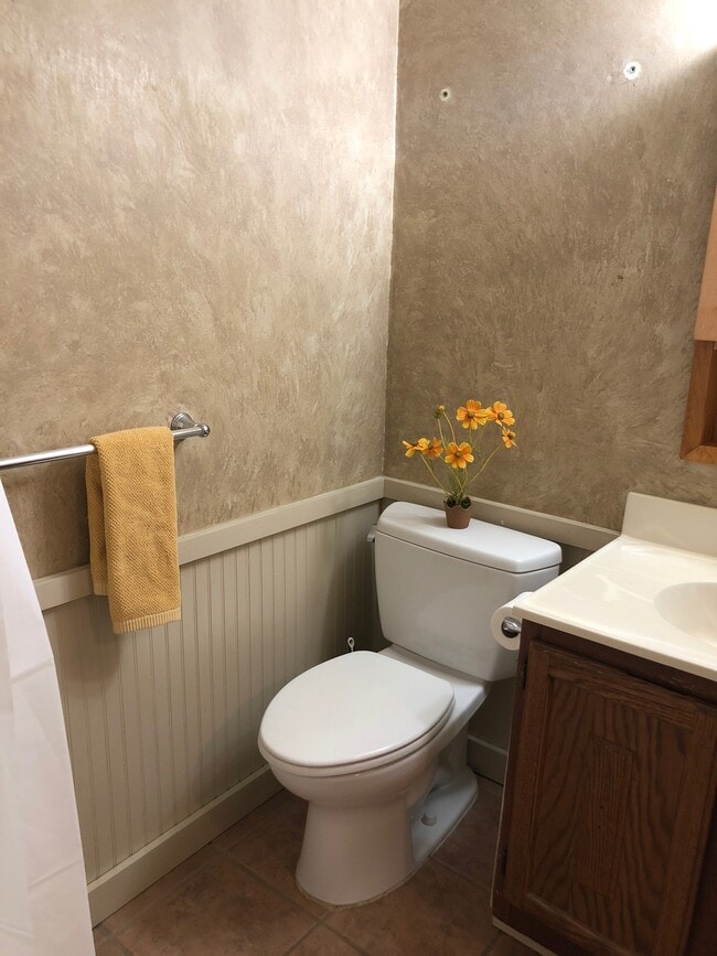 Cute bathroom with good cabinet space, shower with tub and good water pressure. - 608 1/2 Acker Place NE