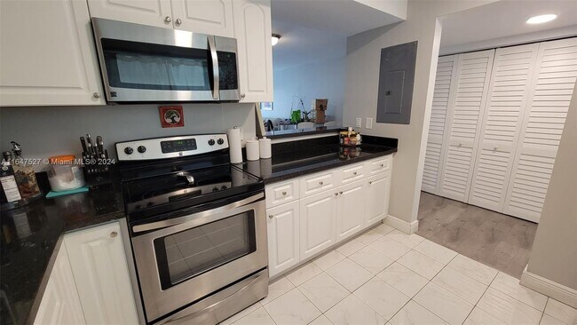 Building Photo - 8900 Collins Ave