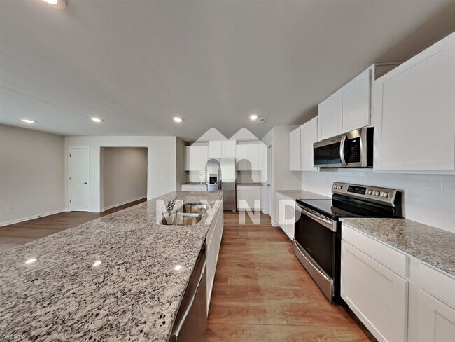 Building Photo - 5 br, 3 bath House - 5207 Spring Breeze Blvd
