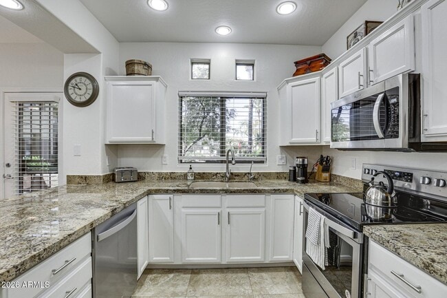 Building Photo - 9100 E Raintree Dr