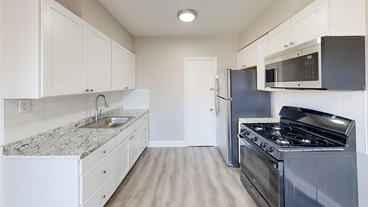 Kitchen of a 2-bedroom apartment - Wynmawr Court Apartments