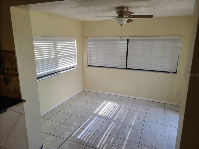 Building Photo - 8847 Tropical Palm Way