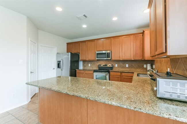 Foto del edificio - 5418 Lilac Grove Ln
