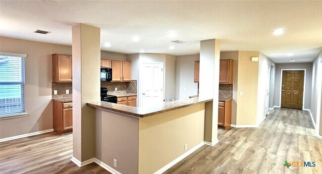 Foto del edificio - 6046 Mule Deer Dr