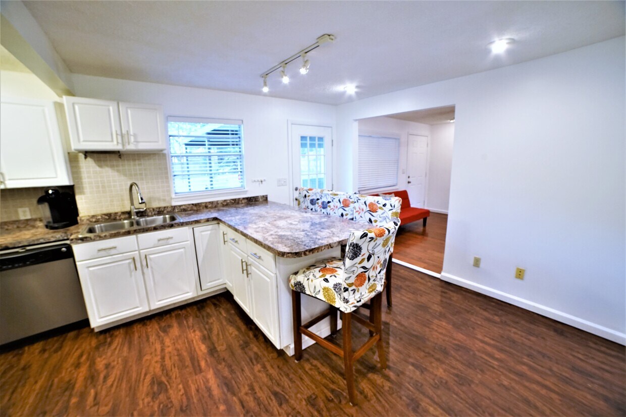 Kitchen with Island bar - 690 NE 23rd Ave