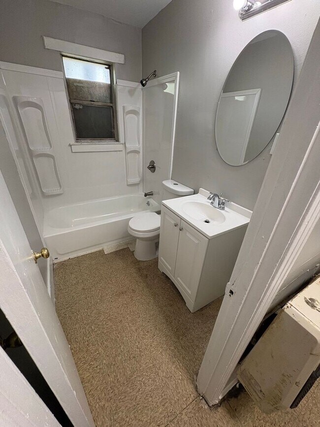 Photo - Charming 2 bedroom 1 bath duplex - Open To Section 8 House