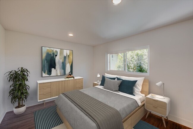 Building Photo - New Two Bedroom | Modern Designer Cabinetry - Quartz Countertops - Stainless-Steel Appliances - R...