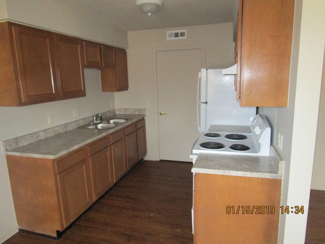 New Cabinets, Counter Top, and Sink - 400 S E Ave