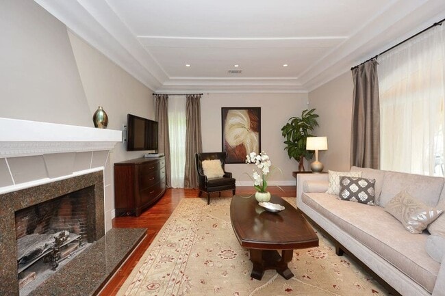 Building Photo - Welcome to this beautifully updated Spanis...