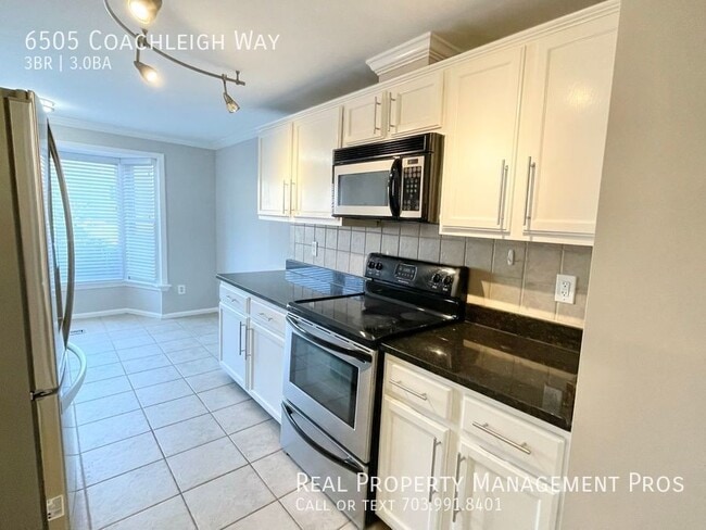 Building Photo - 6505 Coachleigh Way