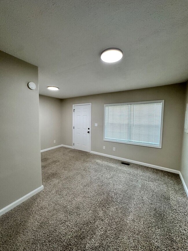 Building Photo - Pet-Friendly 2-Bedroom Home with Deck