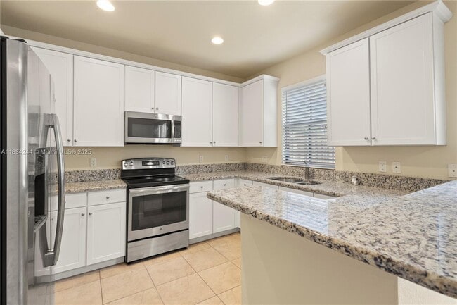 Building Photo - 9600 Town Parc Cir N