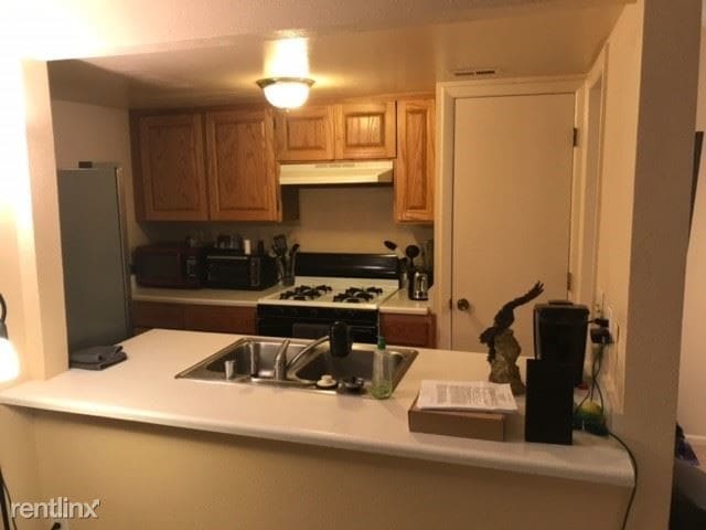 Building Photo - 2 br, 1 bath Condo - 12009 Stilwell Dr NE