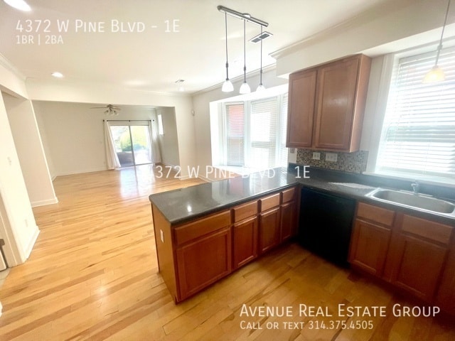 Building Photo - Just Listed! - 4372 West Pine Unit #1E