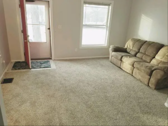 Living room and front door - 652 Clarissa St