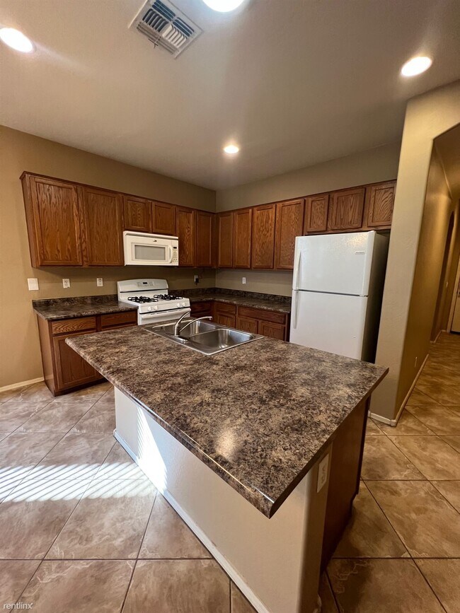 Building Photo - 4 br, 3 bath House - 7421 W Fawn Dr