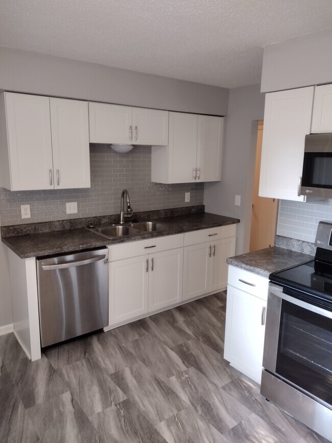 Kitchen Area (Pic 1 of 3) - 2700 64th St