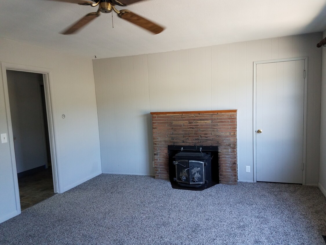 Primary Photo - Ranch style home with fenced back yard