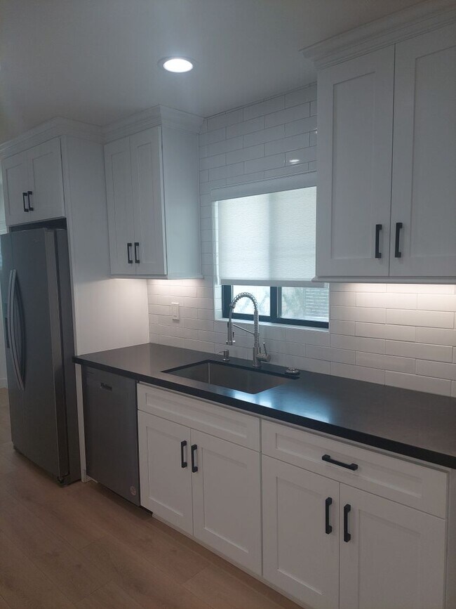 Building Photo - This rental unit truly combines comfort, s...