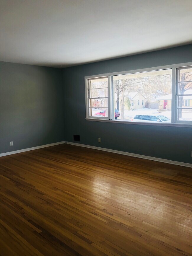 Beautiful large windows in living room - 3652 Upton Ave N