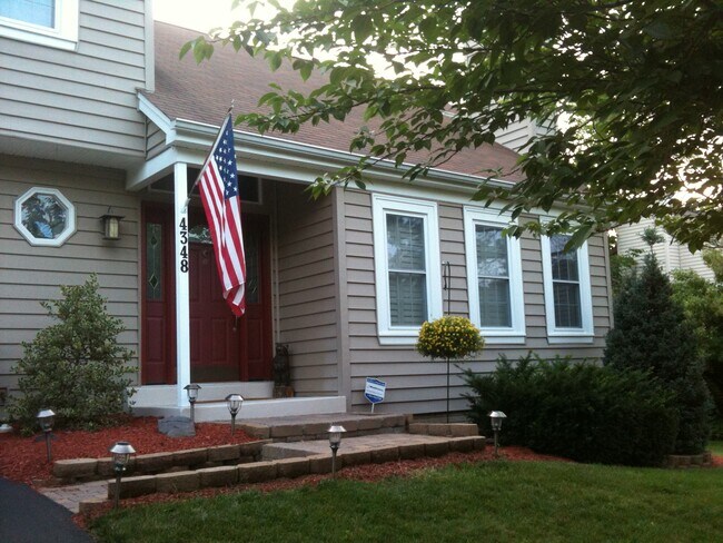 Picture of home in summer. - 4348 Silas Hutchinson Dr