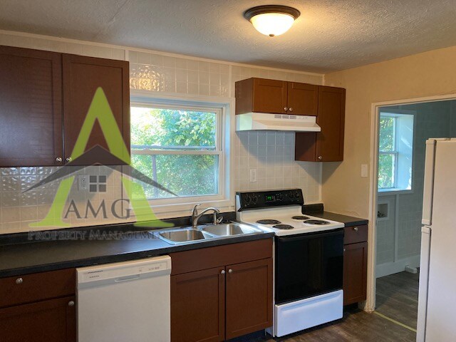 Foto del edificio - 6231 Raleigh Dr