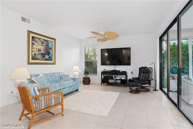 Building Photo - 7048 Pelican Bay Blvd