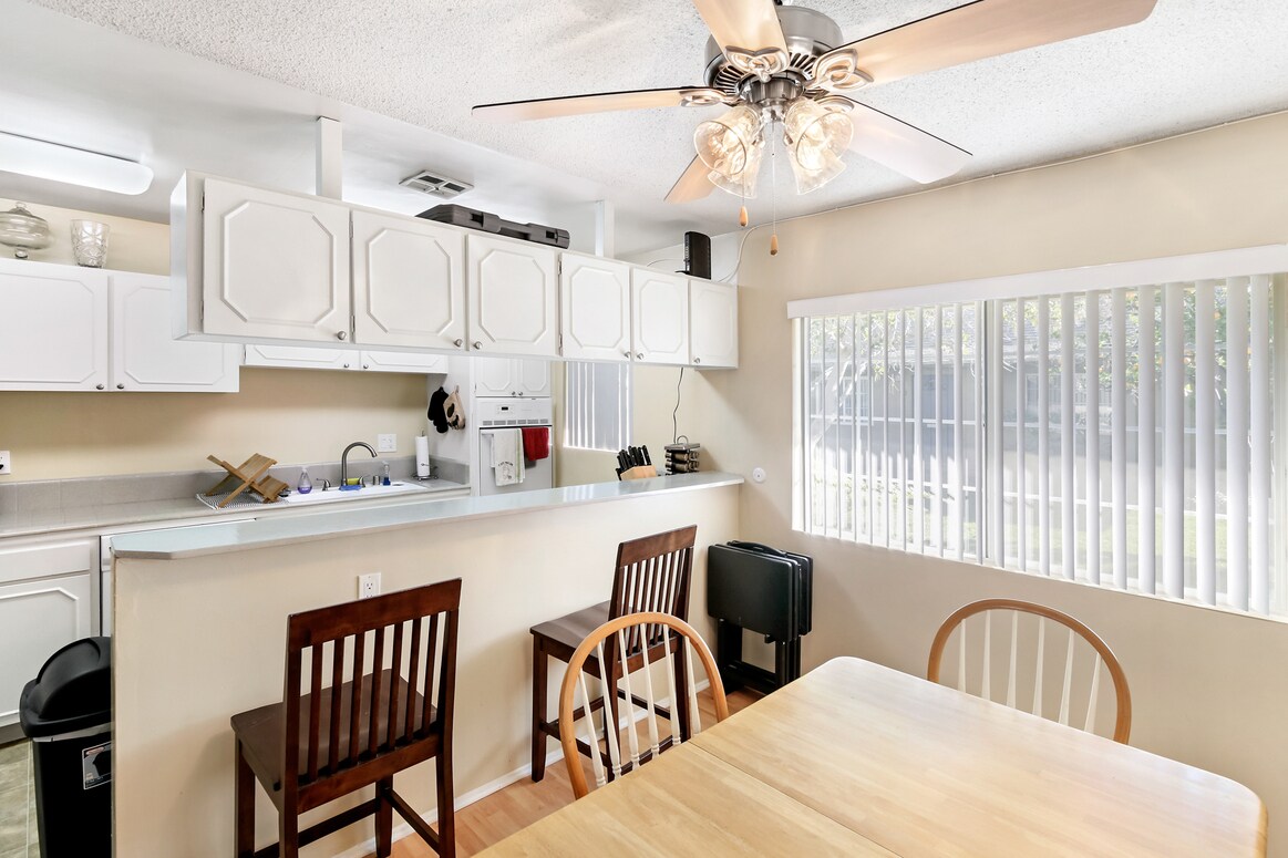 Cocina unitaria y comedor - Mango Tree